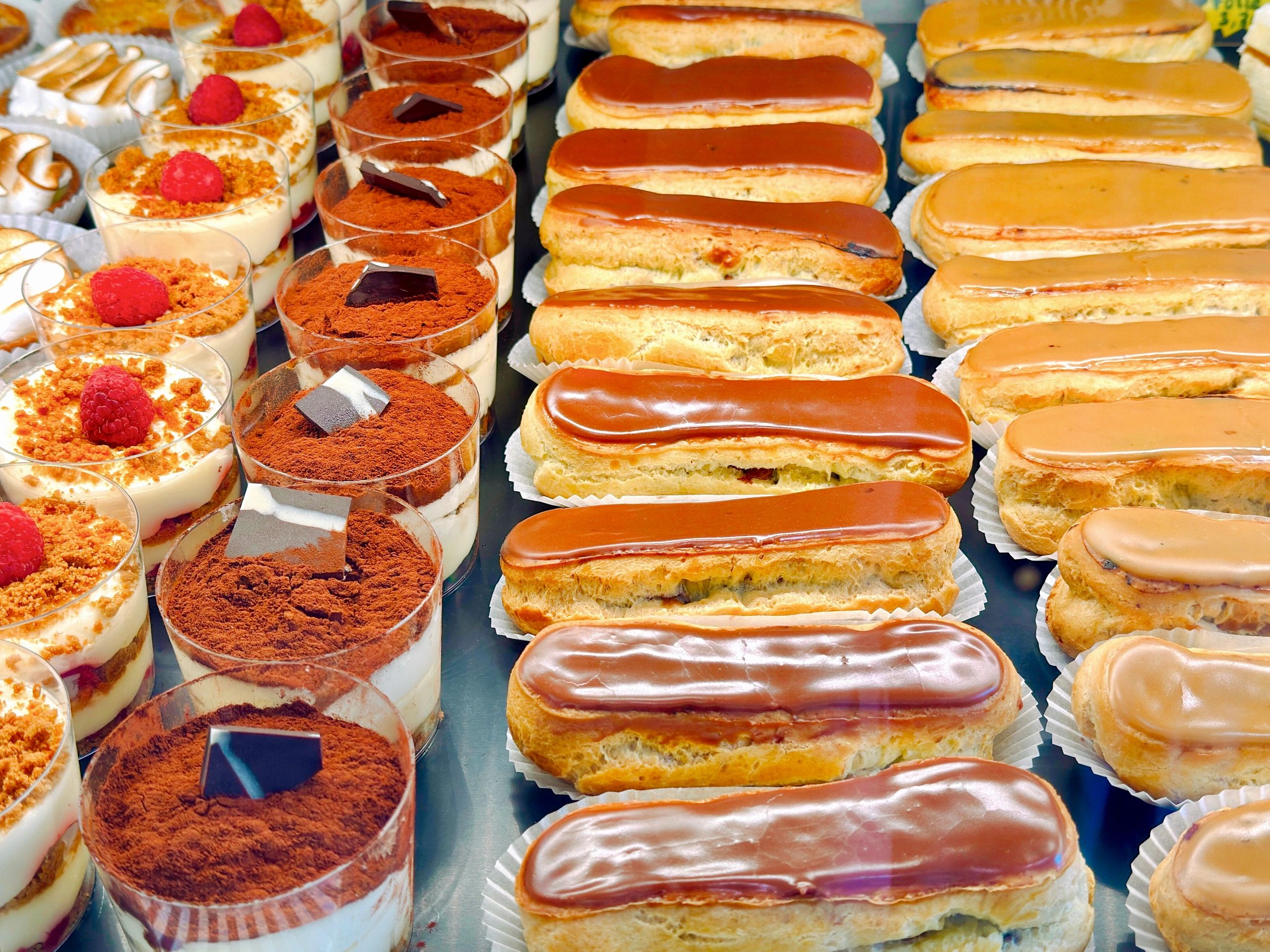 Variety of cakes in bakery showcase